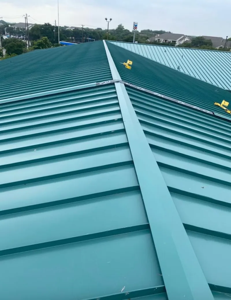 Green commercial metal roof ridge and valley for Metal Roof Repair in Durant